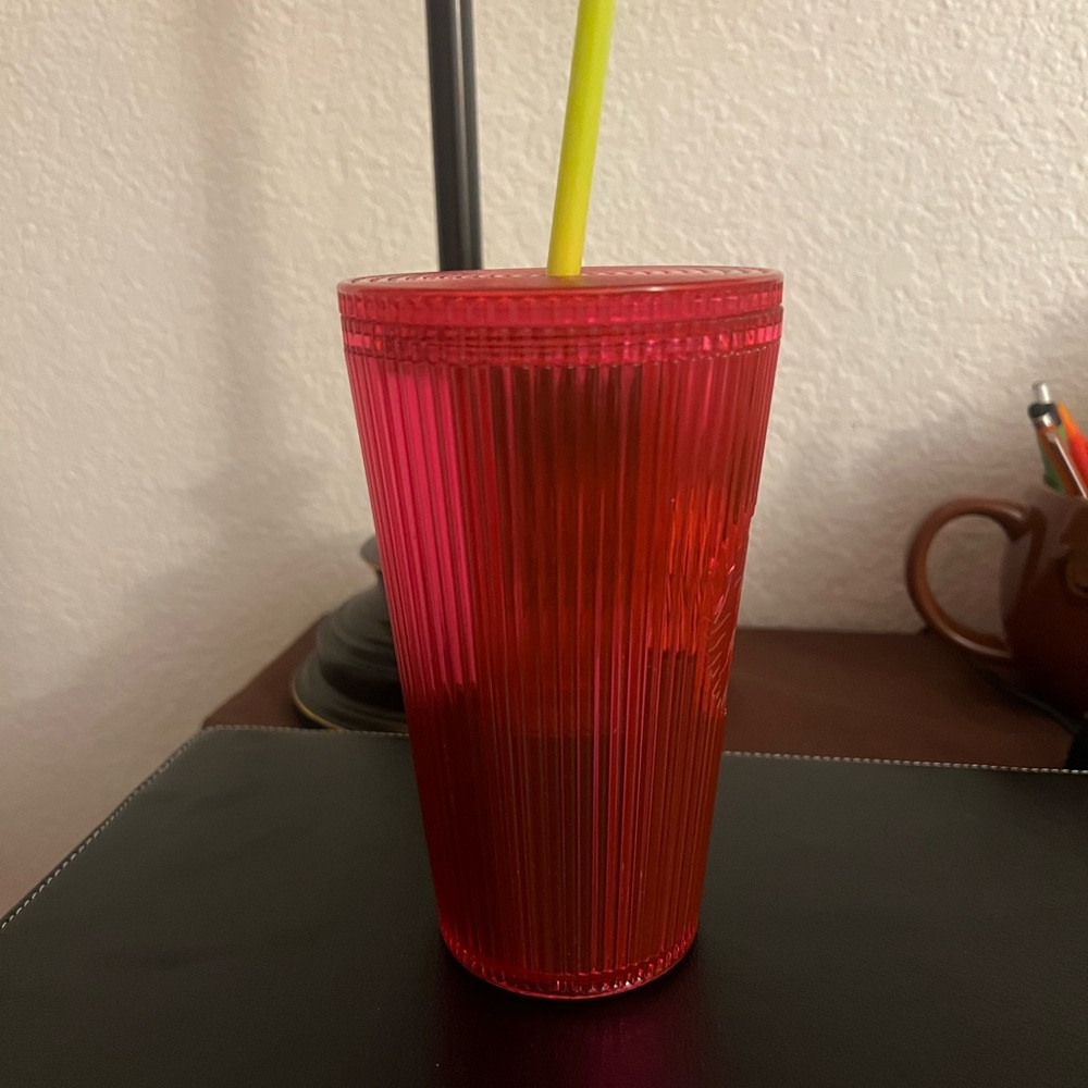 Grand size…  hot pink with a yellow straw….